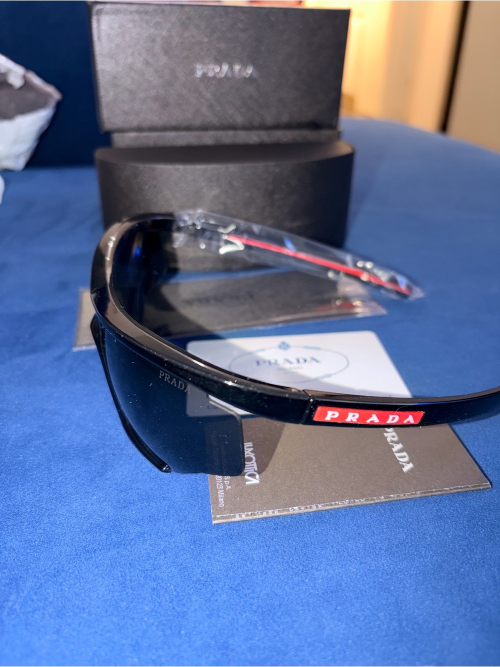Prada Black Sunglasses with Red Temple Accents